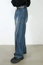 Medium wash denim jeans with wide legs and a prominent vertical seam detail.