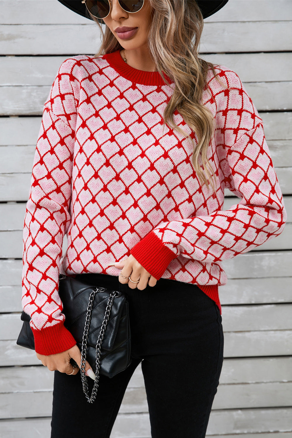 Heart Grid Crewneck Knit sweater in pink and red acrylic with a diamond heart pattern.