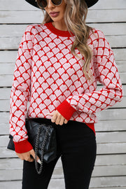 Heart Grid Crewneck Knit sweater in pink and red acrylic with a diamond heart pattern.