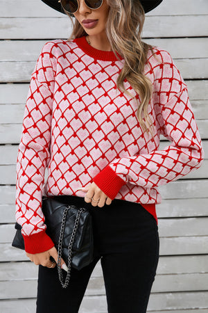 Heart Grid Crewneck Knit sweater in pink and red acrylic with a diamond heart pattern.