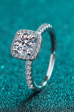 Radiant Square Cut Halo Ring in silver, featuring a central square diamond surrounded by a halo of smaller stones on a