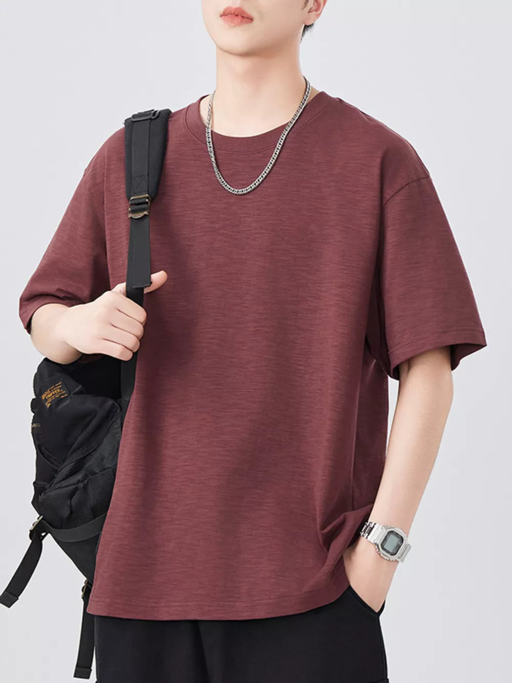 Men's dark red relaxed fit cotton t-shirt with crew neck and short sleeves.