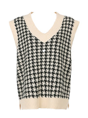 Houndstooth knit v-neck tank top in black and beige with ribbed trim.
