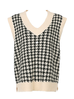 Houndstooth knit v-neck tank top in black and beige with ribbed trim.