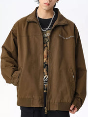 Men's brown cotton zip-up jacket with pockets and embroidered detail.