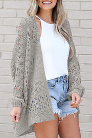 Open-knit slouchy cardigan in Sand with open front and long sleeves.
