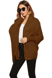 Brown cocoon knit cardigan with shawl collar and batwing sleeves.