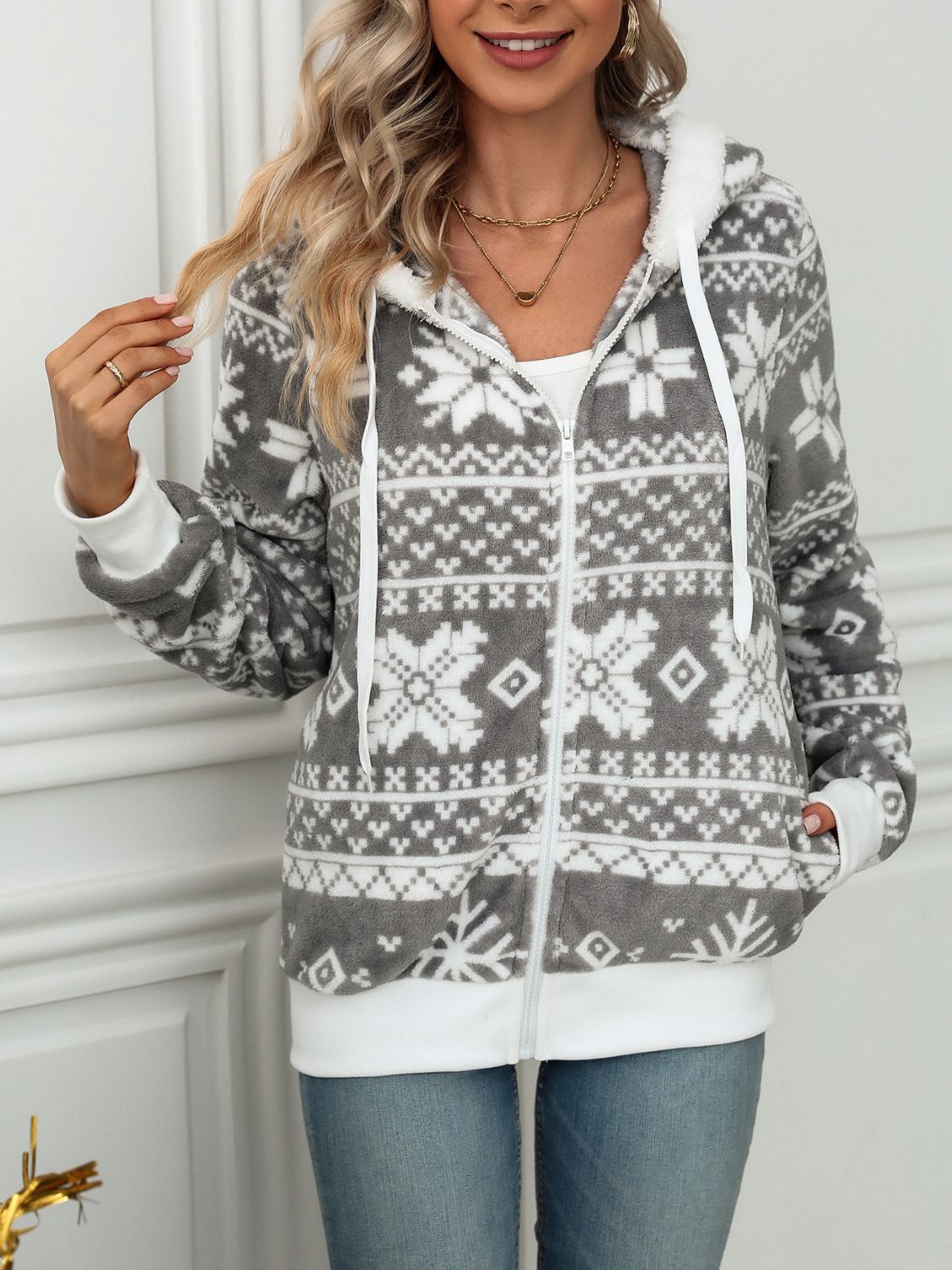 Gray fleece zip-up hoodie with white Fair Isle snowflake pattern and white trim.