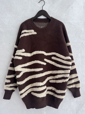 Brown acrylic crewneck sweater with textured cream stripes.