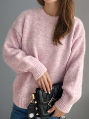 Oversized crewneck sweater in Dusty Pink textured knit with ribbed cuffs and hem.