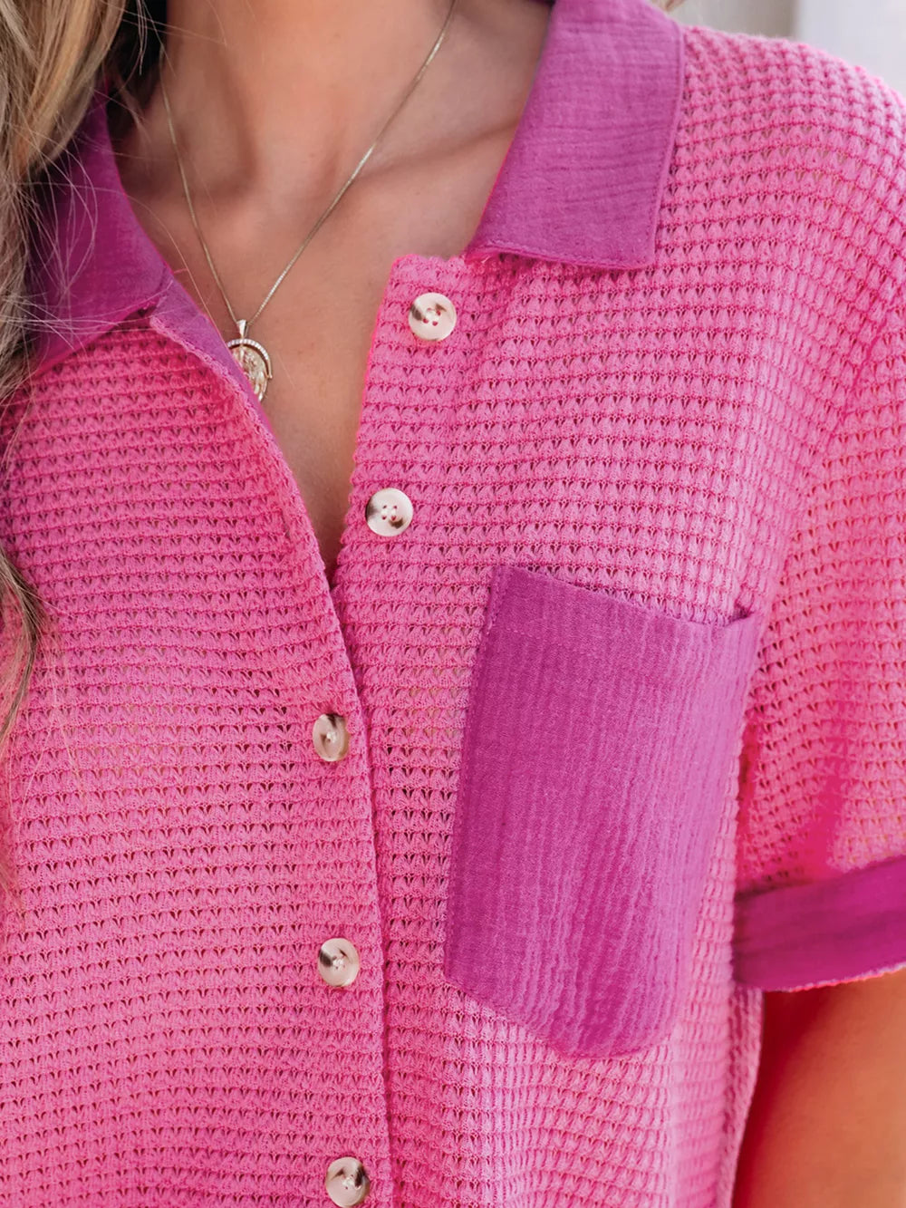 Waffle-knit button-down shirt in cerise with a contrasting pocket and collar.