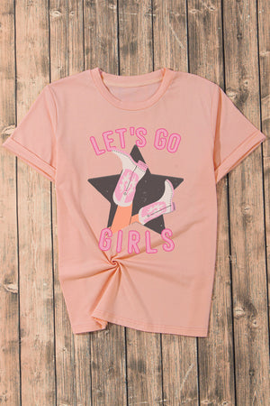 Western graphic tee in watermelon pink with rolled sleeves and "Let's Go Girls" text and cowboy boot graphic.