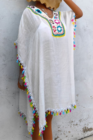 White kaftan dress with colorful crochet yoke and tassel trim
