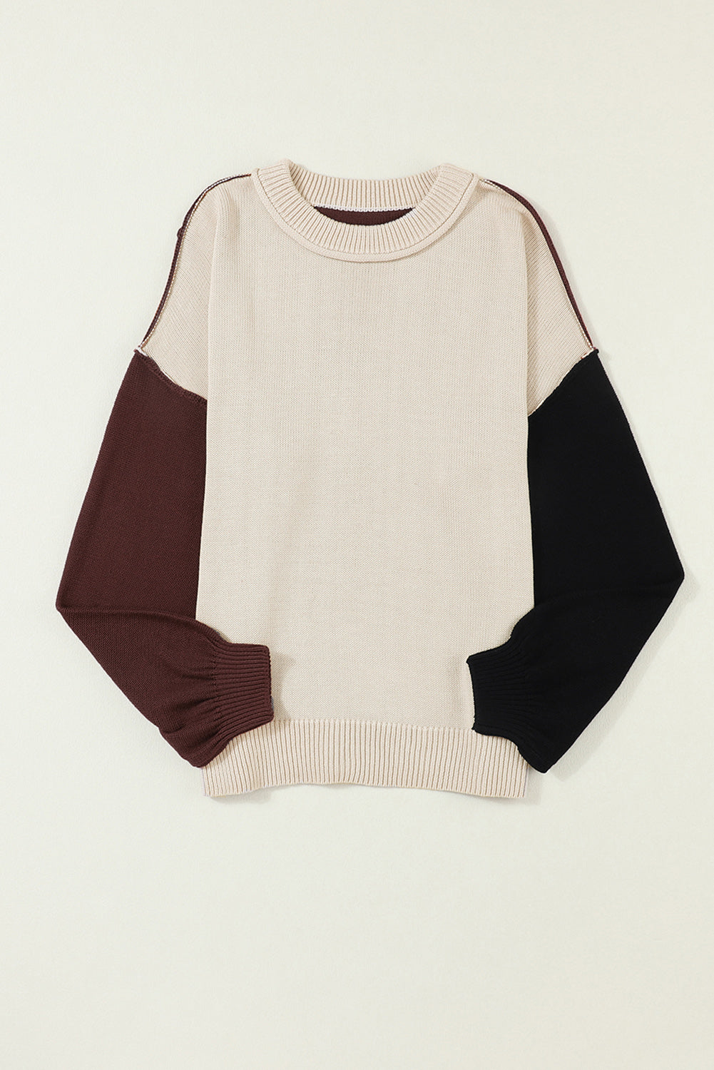 Chic Contrast Cozy Sweater in cream with brown and black balloon sleeves and crew neck.