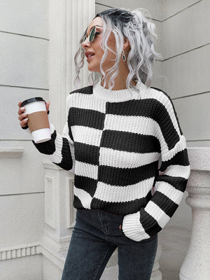 Black and white striped acrylic sweater with crew neck and long sleeves