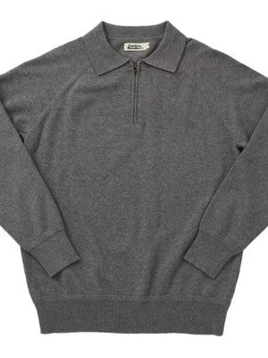 Dark Gray knit polo with zip-through neckline and raglan sleeves.