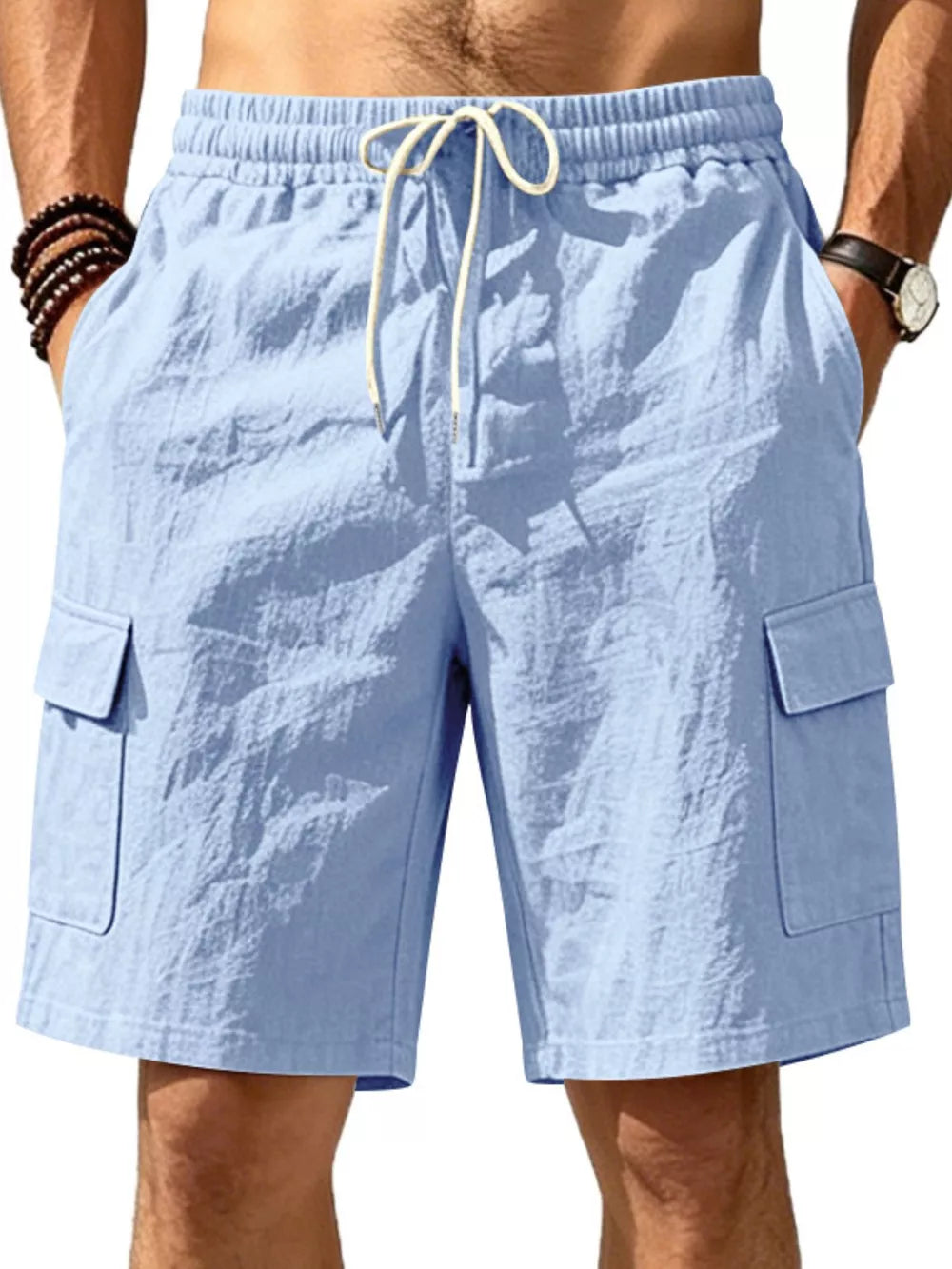 Light blue cargo shorts with drawstring waist and crinkled texture.
