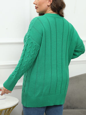 Cable knit diamond stitch sweater in Dark Green acrylic with ribbed cuffs and hem.