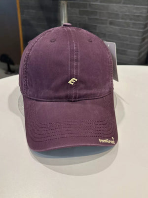 Embroidered cotton baseball cap in Sauce Purple with curved brim and gold logo detail.