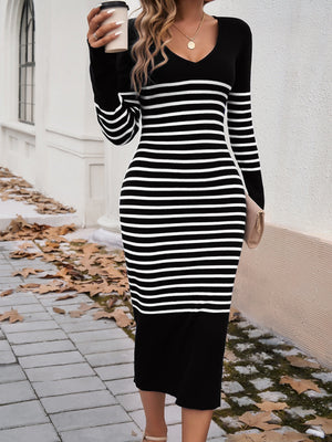 Black and white striped knit midi dress with V-neck and flared sleeves.