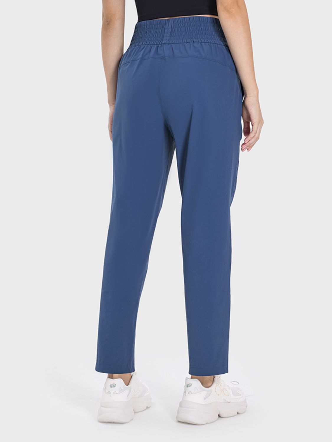 Peacock blue performance trousers with elastic waistband and straight leg
