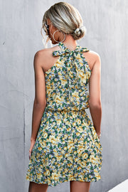 Yellow floral halter neck mini dress with tie back detail
