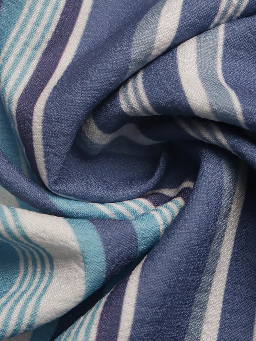 Lively striped drawstring wide-leg pants in blue and white, showing fabric detail.