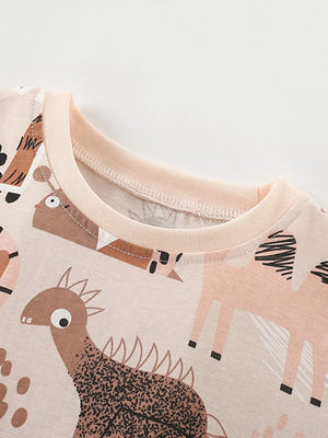 Toddler cotton crew neck tee with playful animal print and light pink trim.