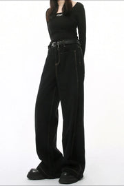Dark wash denim jeans with stitched edges and a straight-leg cut.