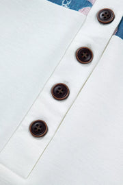 White maternity t-shirt with floral print detail and four brown buttons
