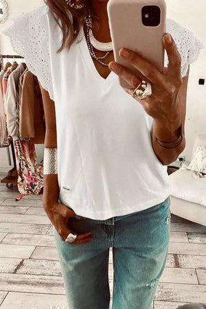 White cotton t-shirt with eyelet flutter sleeves and V-neck.