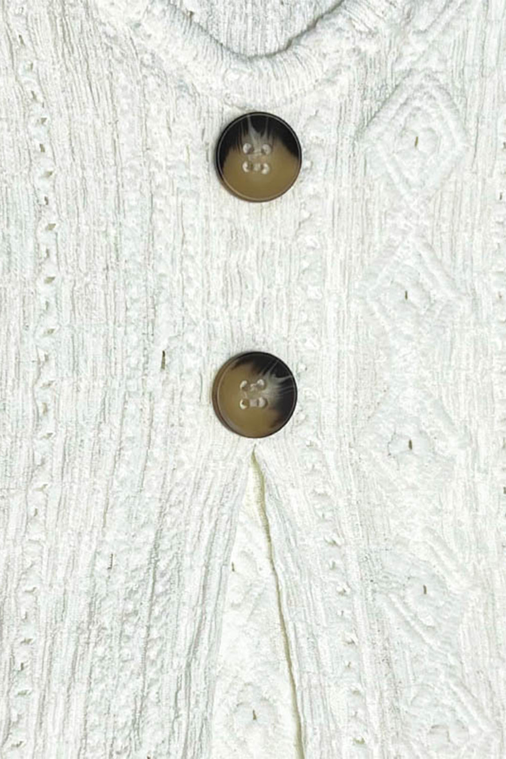 White textured diamond-stitch button-down blouse with tortoise buttons