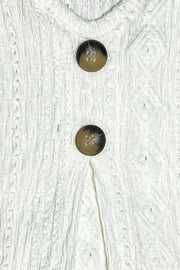 White textured diamond-stitch button-down blouse with tortoise buttons