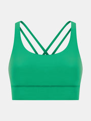 Green performance bra with crisscross back straps and a scoop neckline.