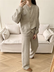Taupe ribbed knit cardigan and wide leg pants set with button front and chest pocket.