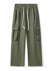 Military green cotton cargo sweatpants with drawstring and wide legs.