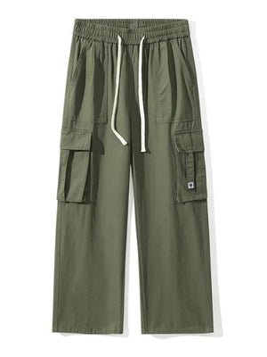 Military green cotton cargo sweatpants with drawstring and wide legs.