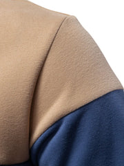 Colorblock rugby shirt in khaki and dusty blue with contrast collar detail.