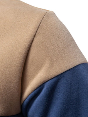 Colorblock rugby shirt in khaki and dusty blue with contrast collar detail.
