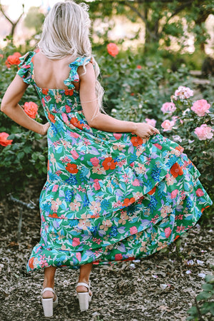 Floral ruffle-sleeve midi dress in dark green with smocked bodice and tiered skirt.