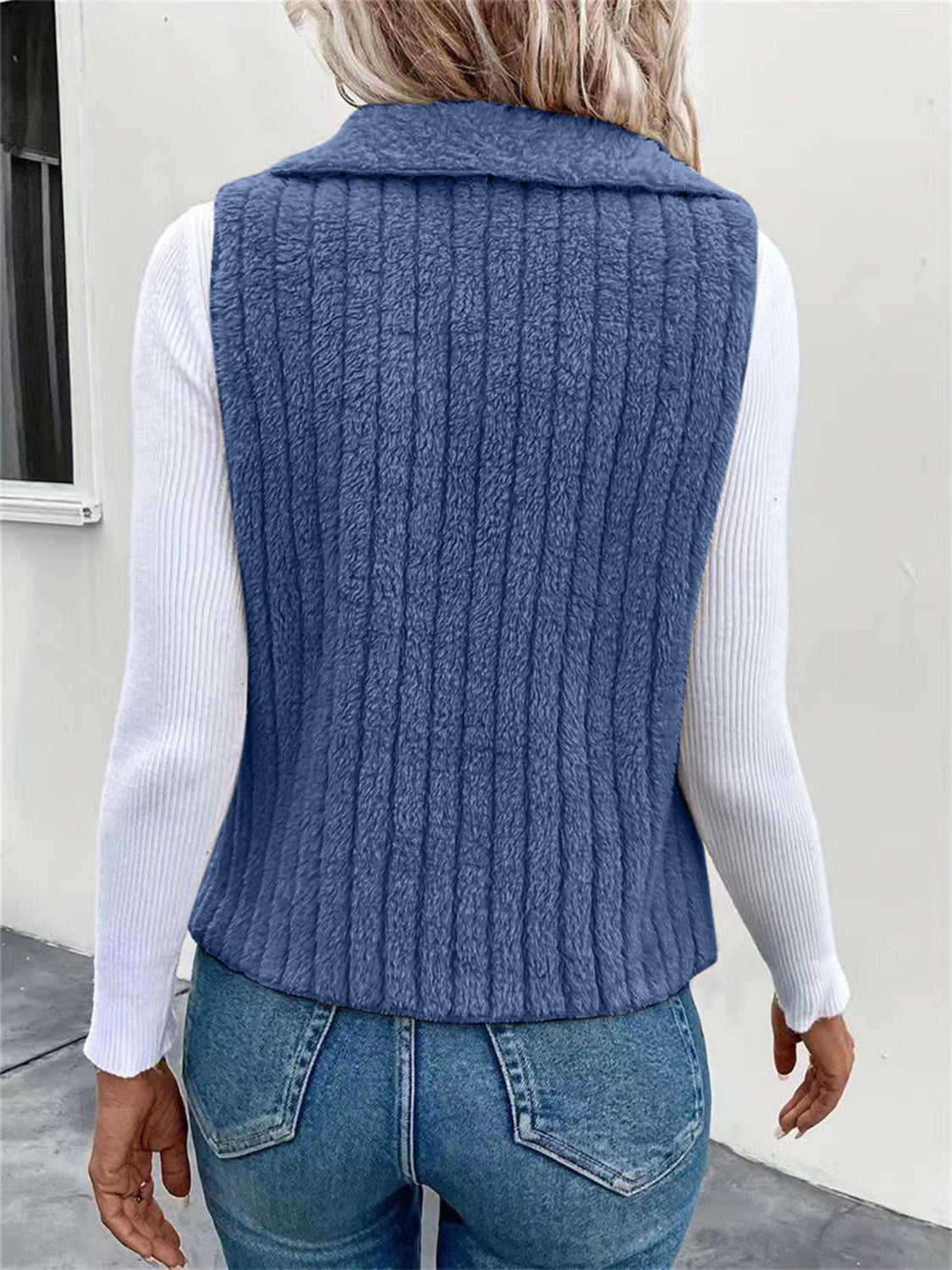 Textured teddy collarless vest in Dusty Blue with ribbed detail.
