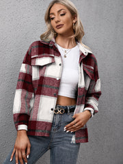 Burgundy plaid oversized button-up shirt with white and grey accents, featuring chest pockets and a relaxed fit.