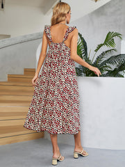 Leopard print midi dress in deep red with ruffle straps and a cinched waist.