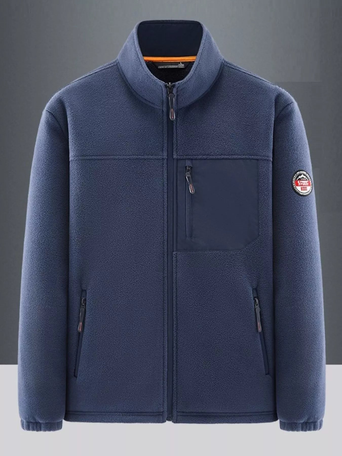 Men's dark blue fleece sport jacket with stand collar, zip front, and chest pocket.