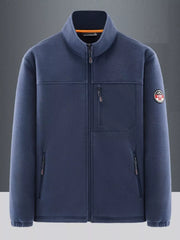 Men's dark blue fleece sport jacket with stand collar, zip front, and chest pocket.