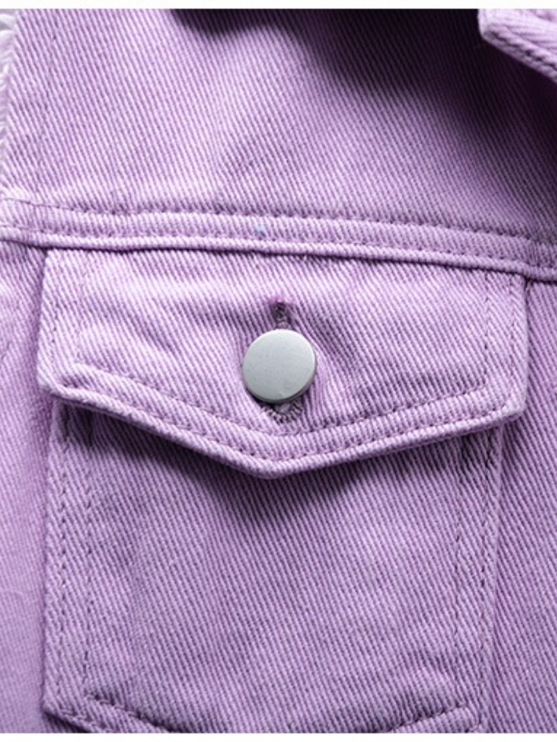 Lavender denim vest with buttoned chest pocket and frayed shoulder detail