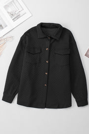 Black quilted overshirt with patch pockets and button front.