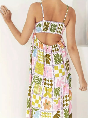 Maternity cami swim dress with cutout back and colorful floral patchwork print.
