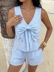 Blue and white striped two-piece set with a large bow detail on the top and drawstring shorts.