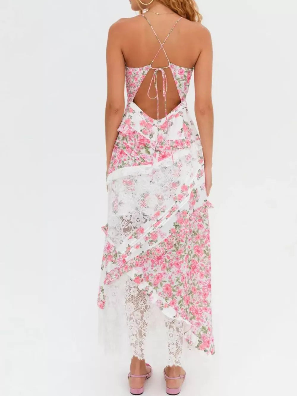 Floral lace maxi dress with ruffles in pink floral print and white lace, featuring a low back with tie.